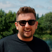 Man wearing sunglasses with a blurred natural background Portable Sauna
