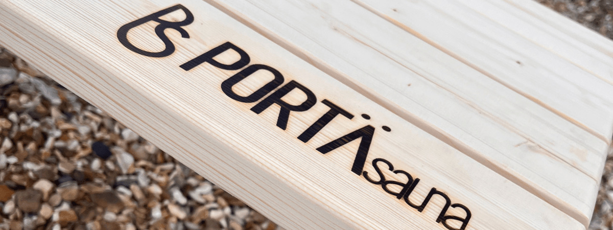 PortaSauna accessories including fire gloves, sauna hats, and setup essentials
